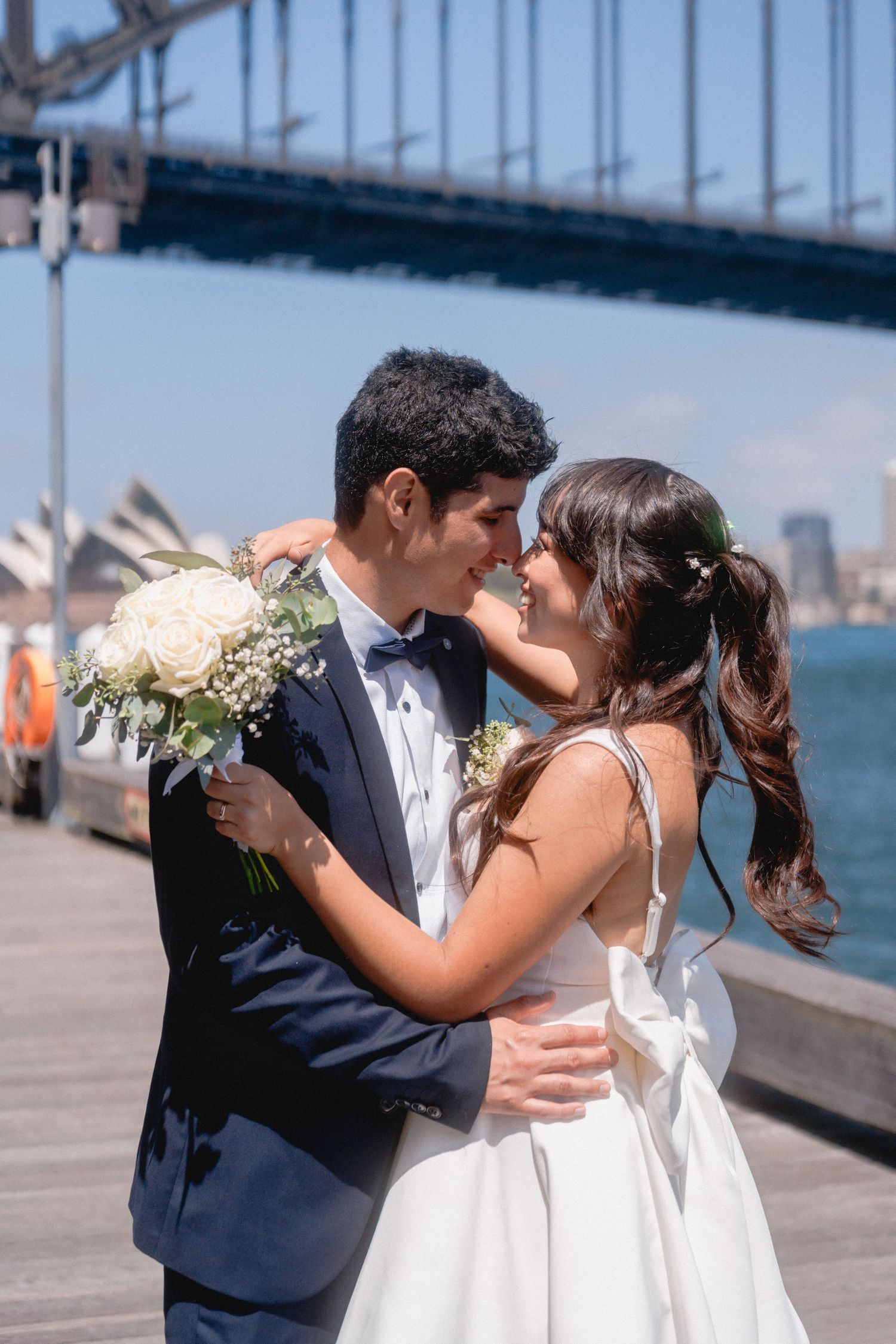 Romantic wedding photos captured on a sunny day by Sydney Harbour.