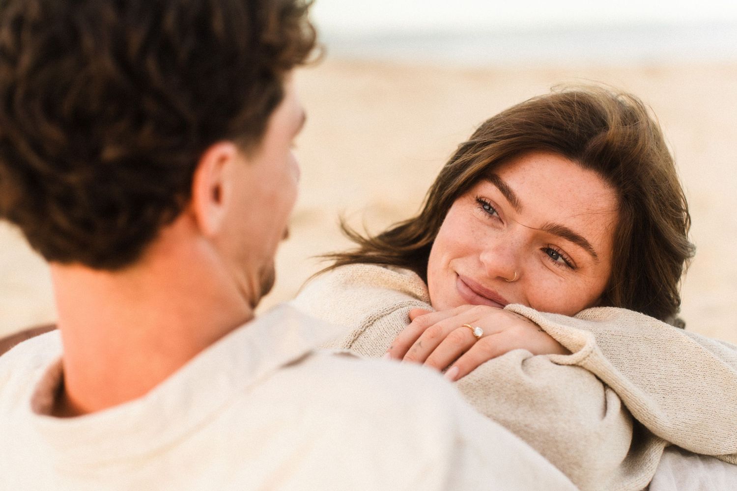 Intimate close-up moments between couple in natural lighting.
