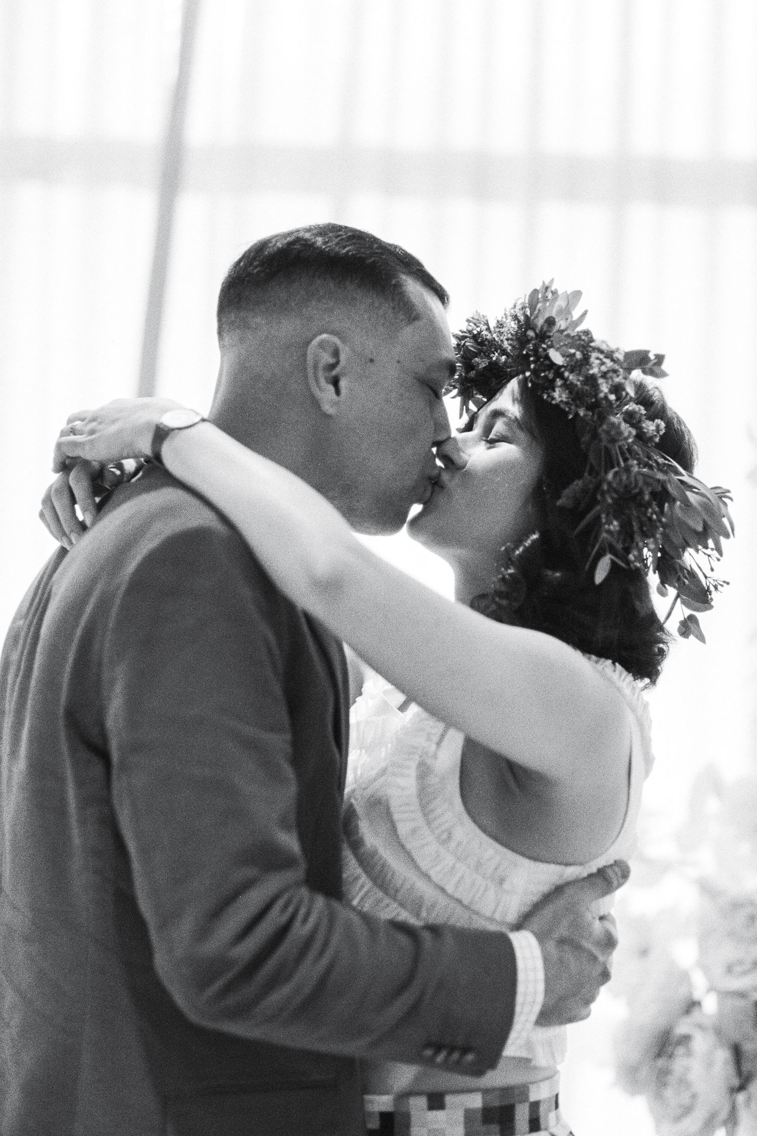 Romantic dance sequence captured in soft window light.