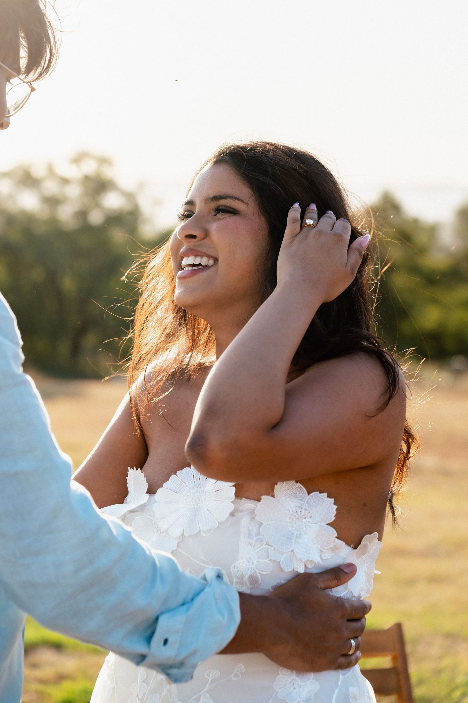 A joyful moment captured during a sunset proposal.