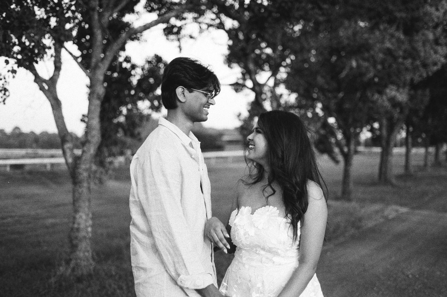 Black and white outdoor portrait sequence showing romantic moments between a couple.