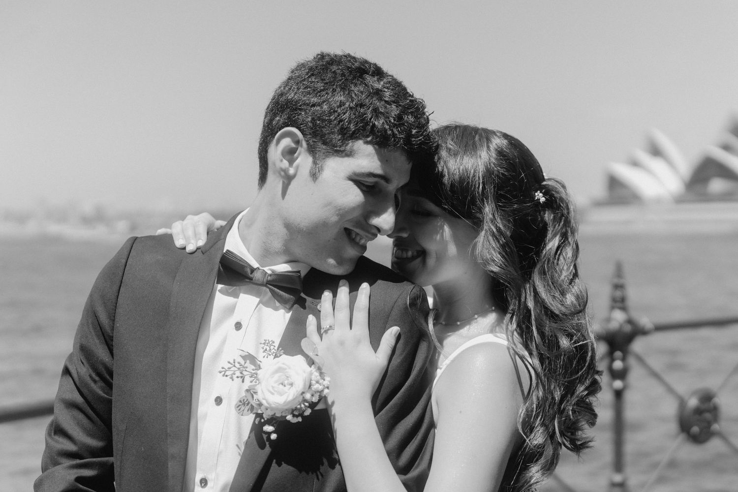 A tender black and white portrait of a couple during their wedding photoshoot.