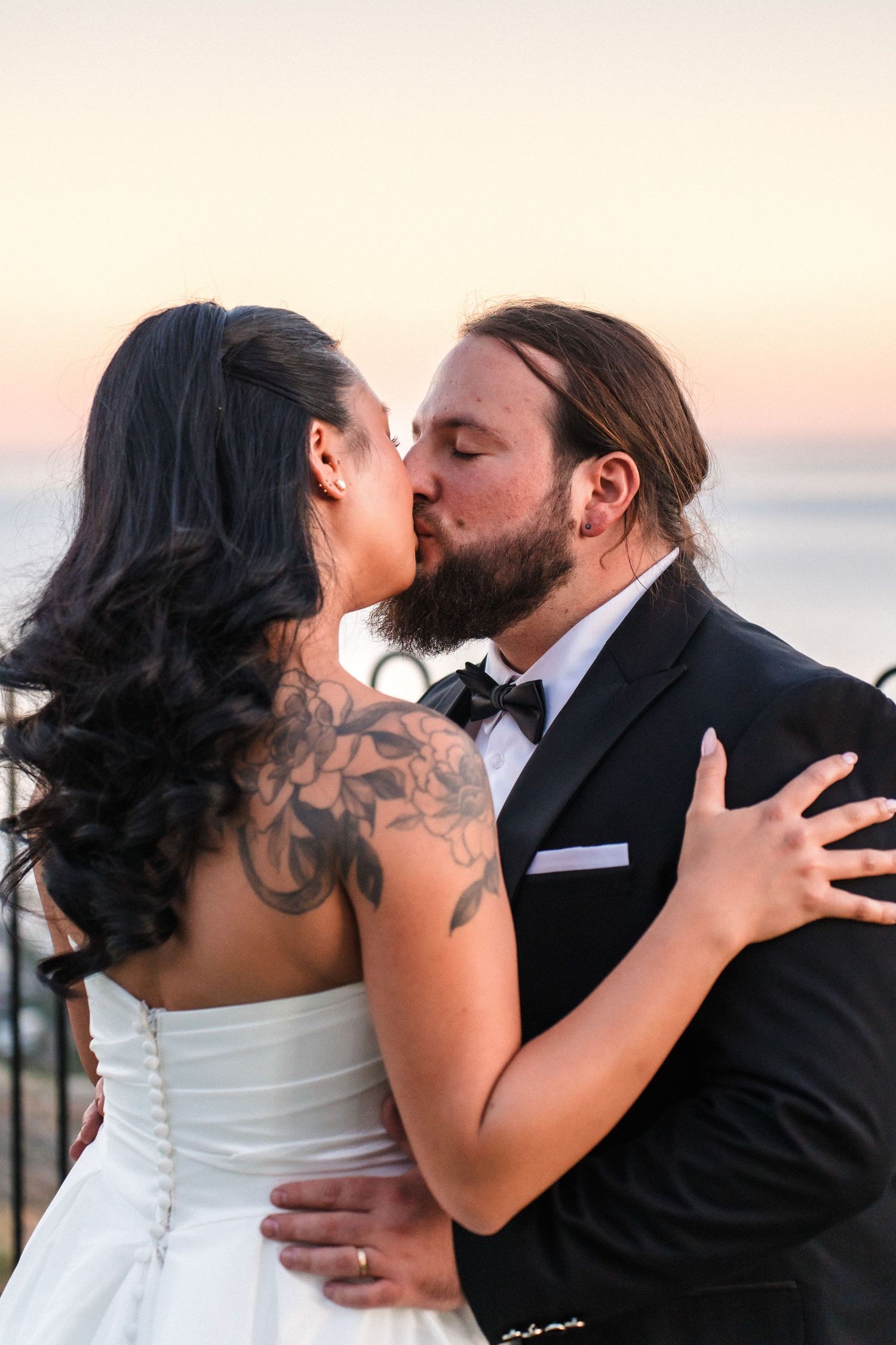 Romantic sunset kiss sequence captured in multiple frames.
