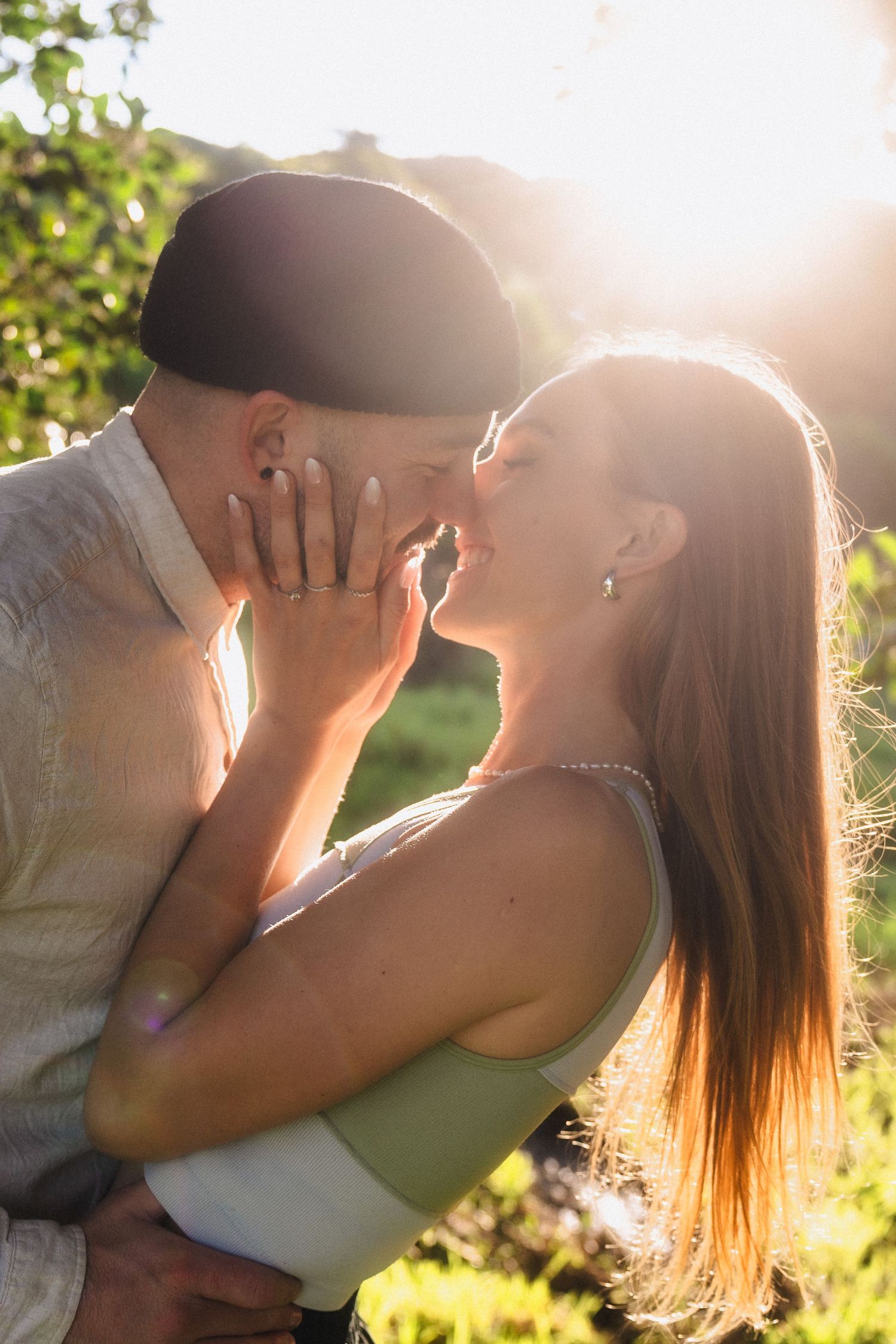 Golden hour portrait sequence showing tender moments between a couple in nature.