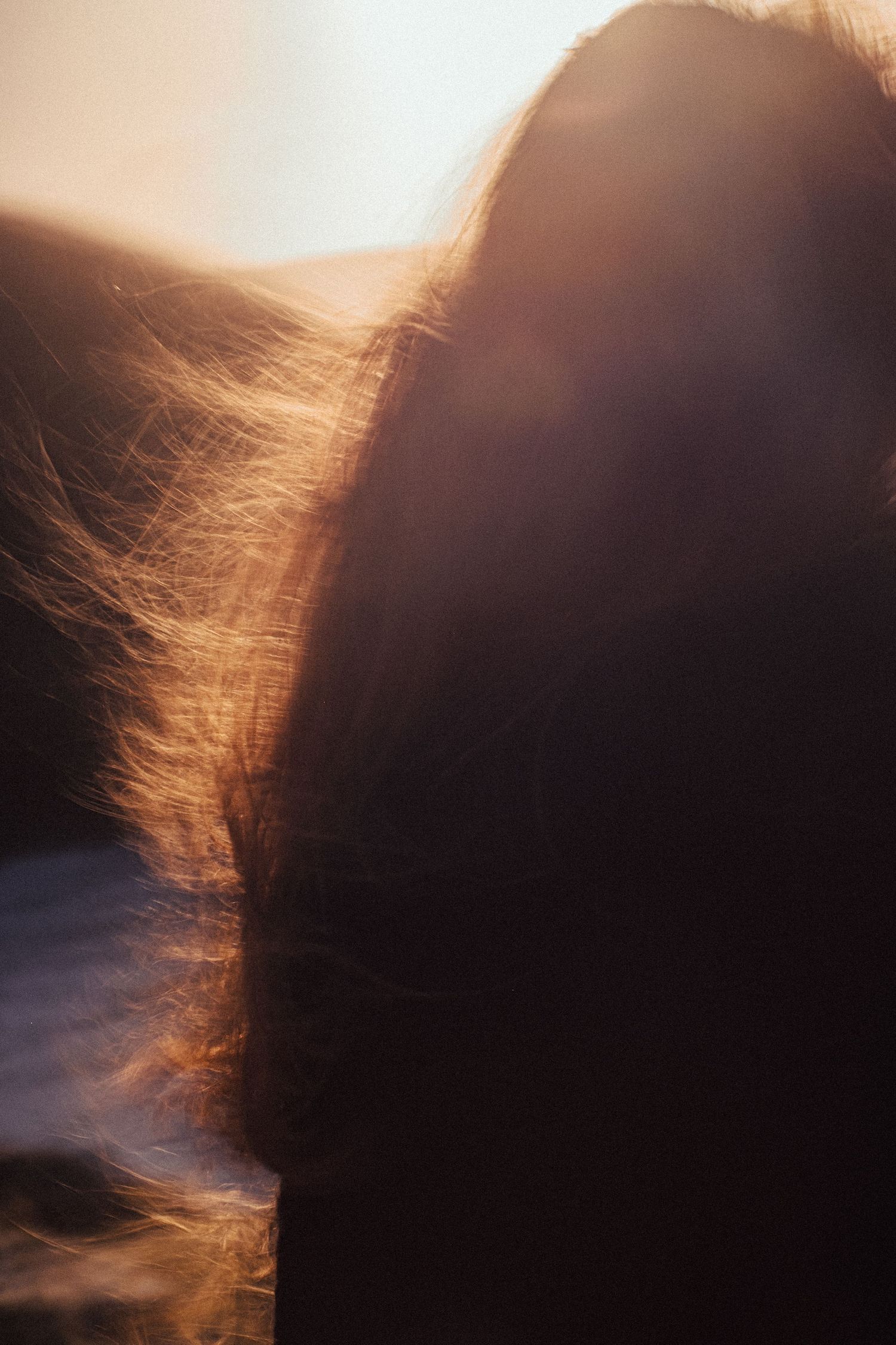 emotive fashion photoshoot in the sunset of cornwall coastline