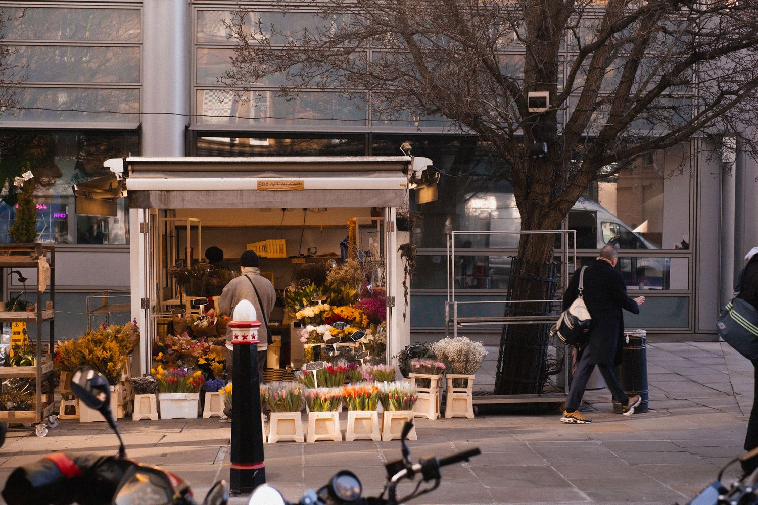 london street photography of flower street stall