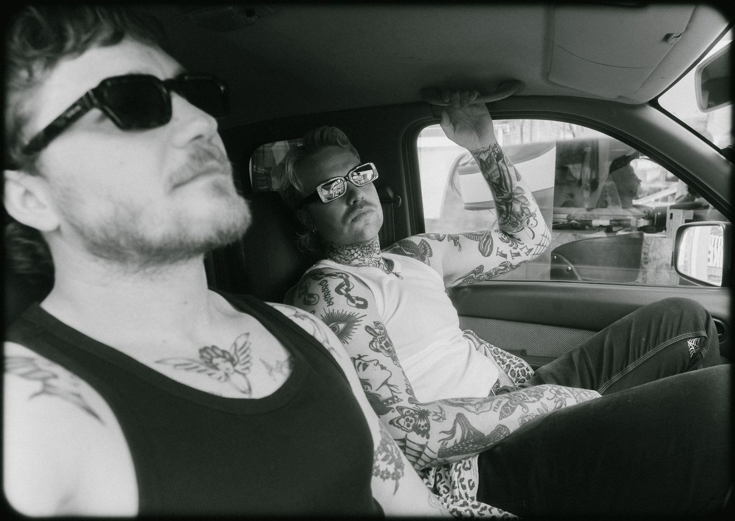 Black and white photo sequence showing someone smoking in a car interior.