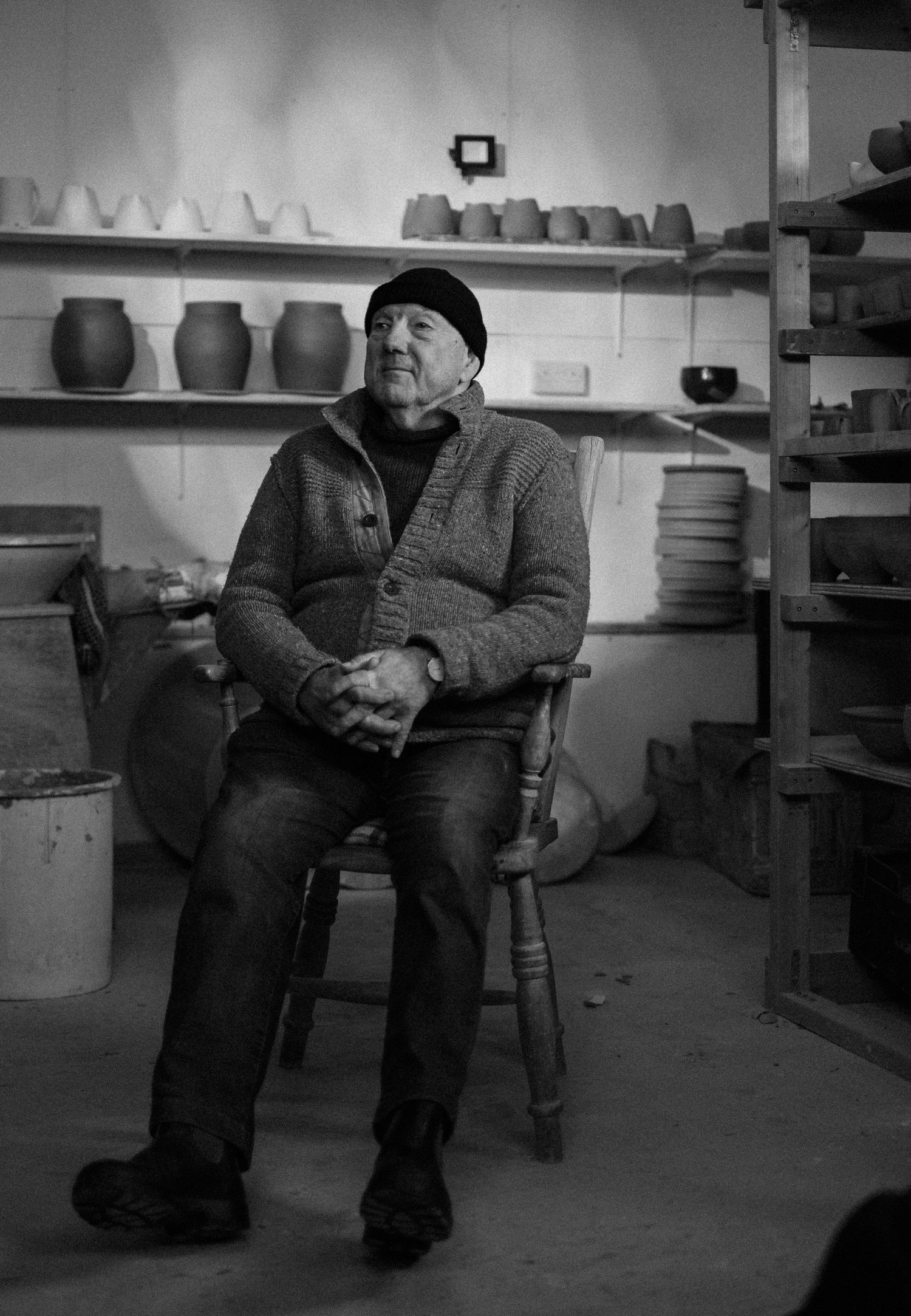 Jack Doherty potter sat in his studio