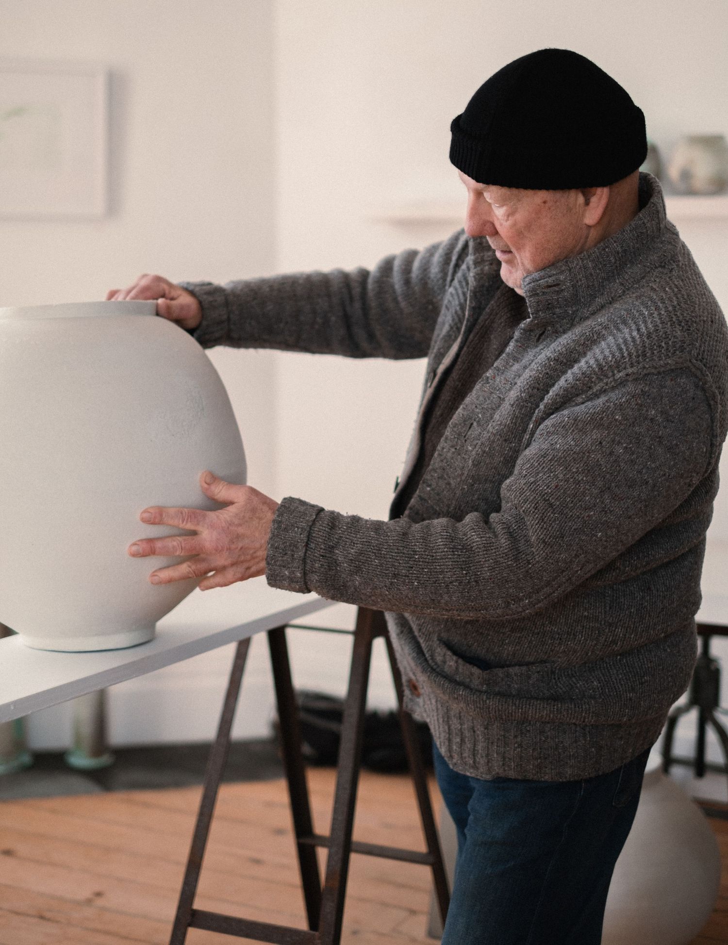 Jack Doherty in his gallery with is moon jars