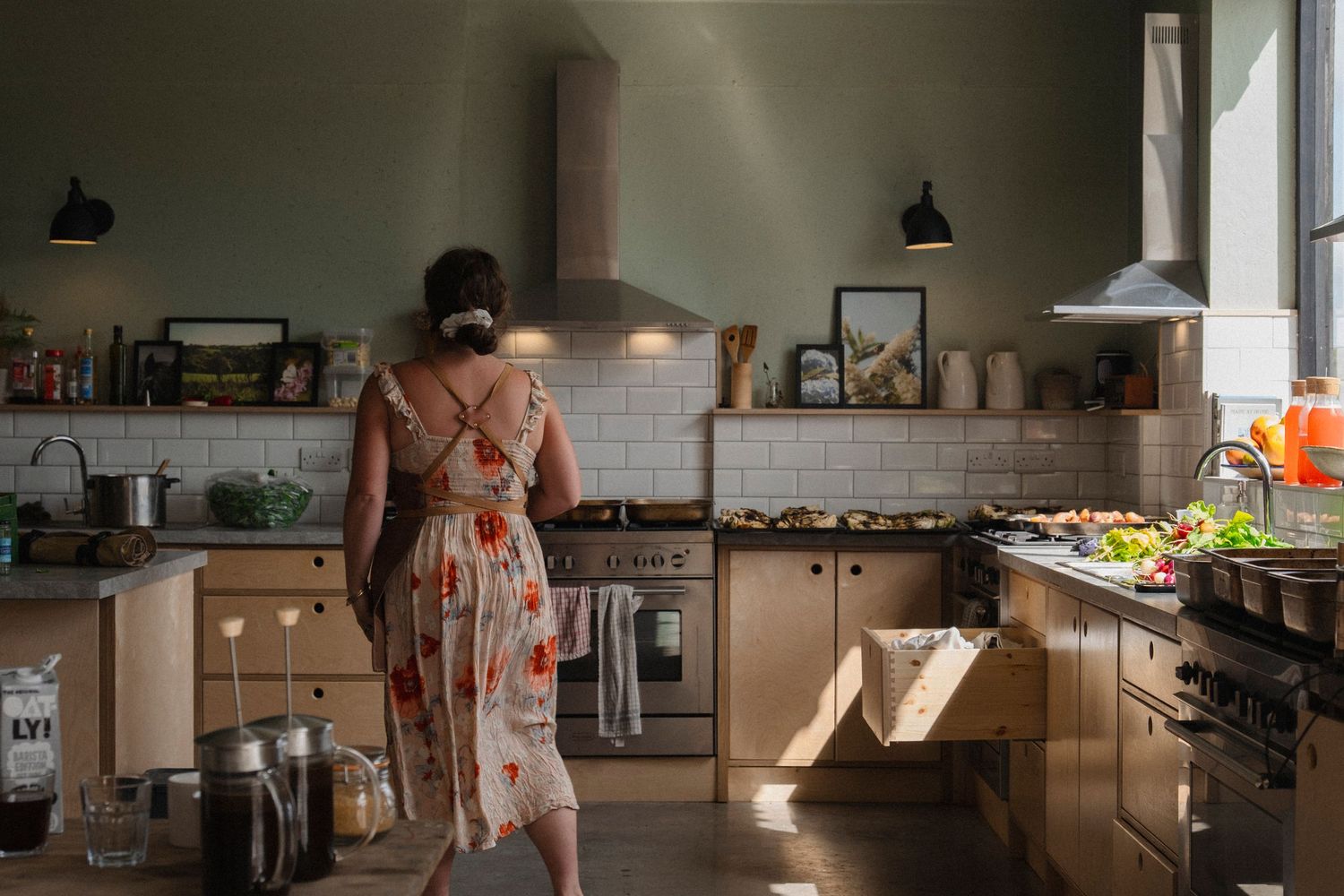Interior of a rustic kitchen with natural light streaming through windows.