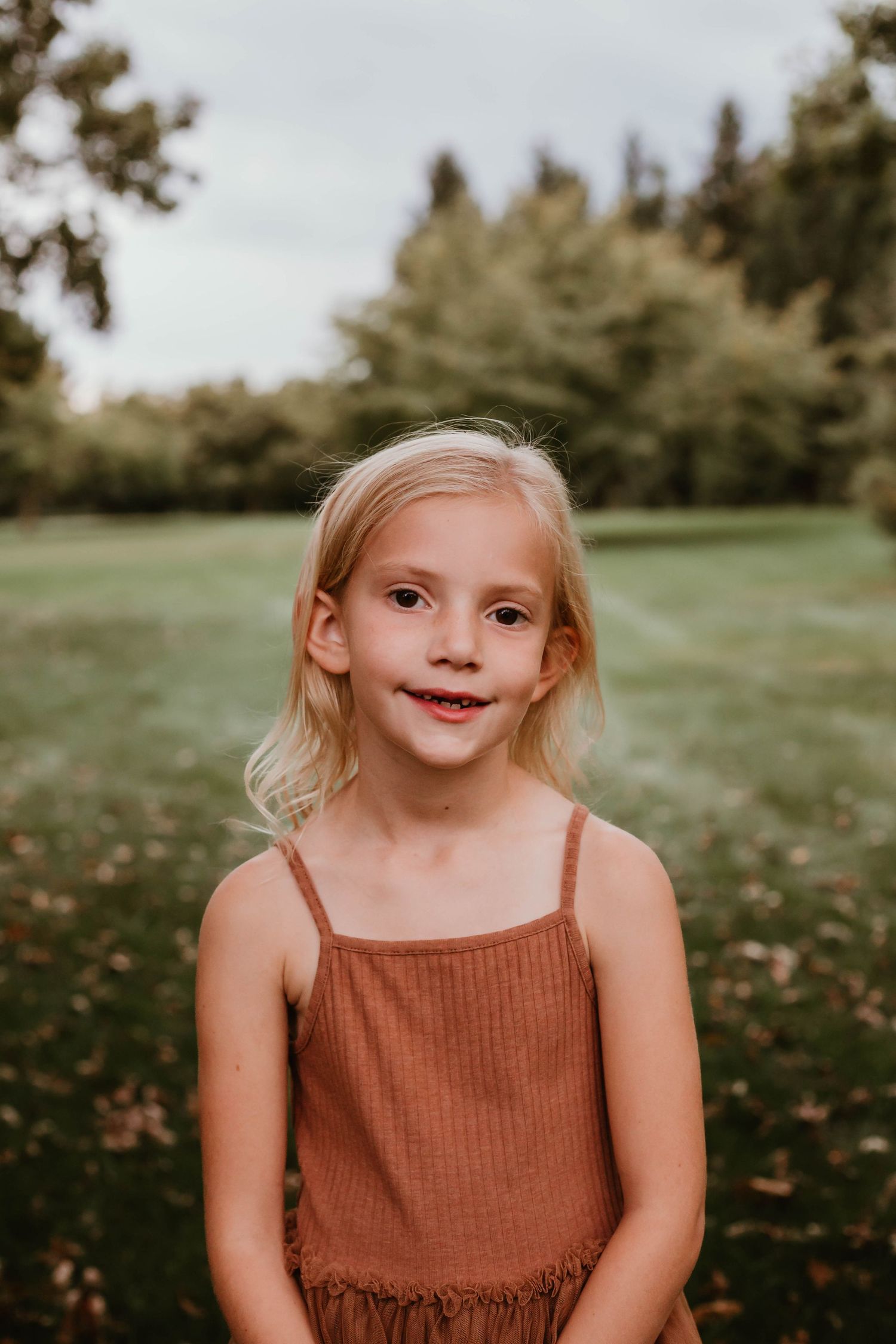 Portrait of girl in grassy field Southeast Minnesota