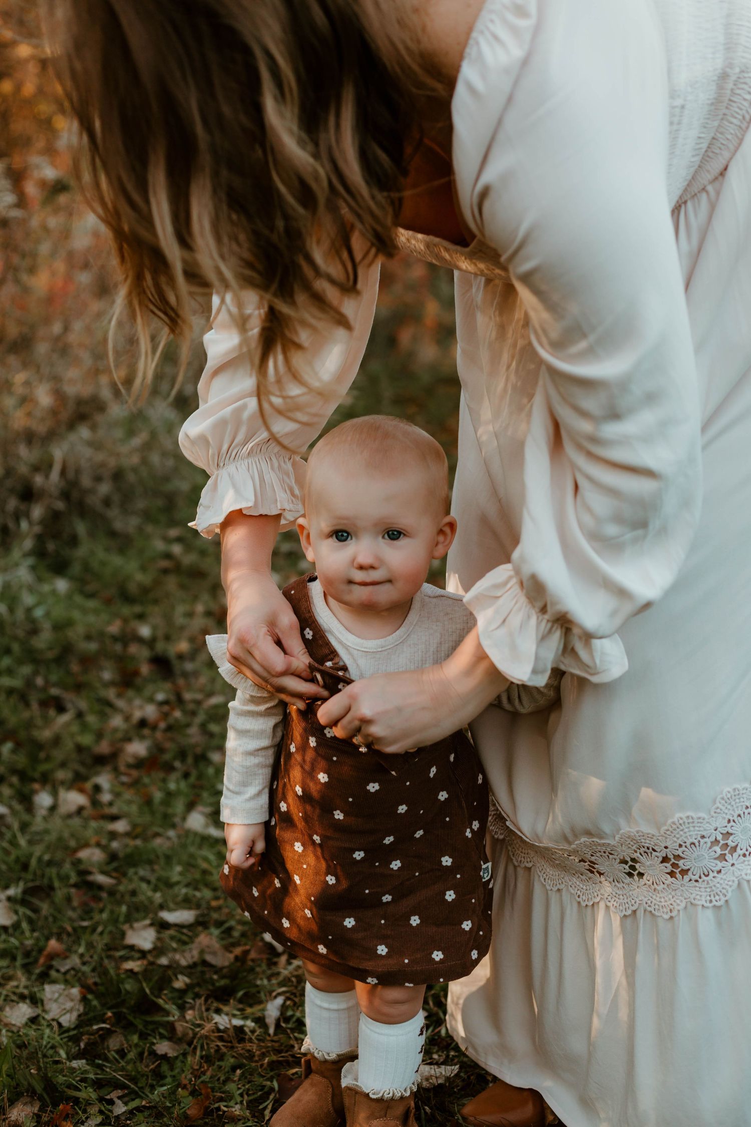 Mom and daughter in grassy field Southeast Minnesota