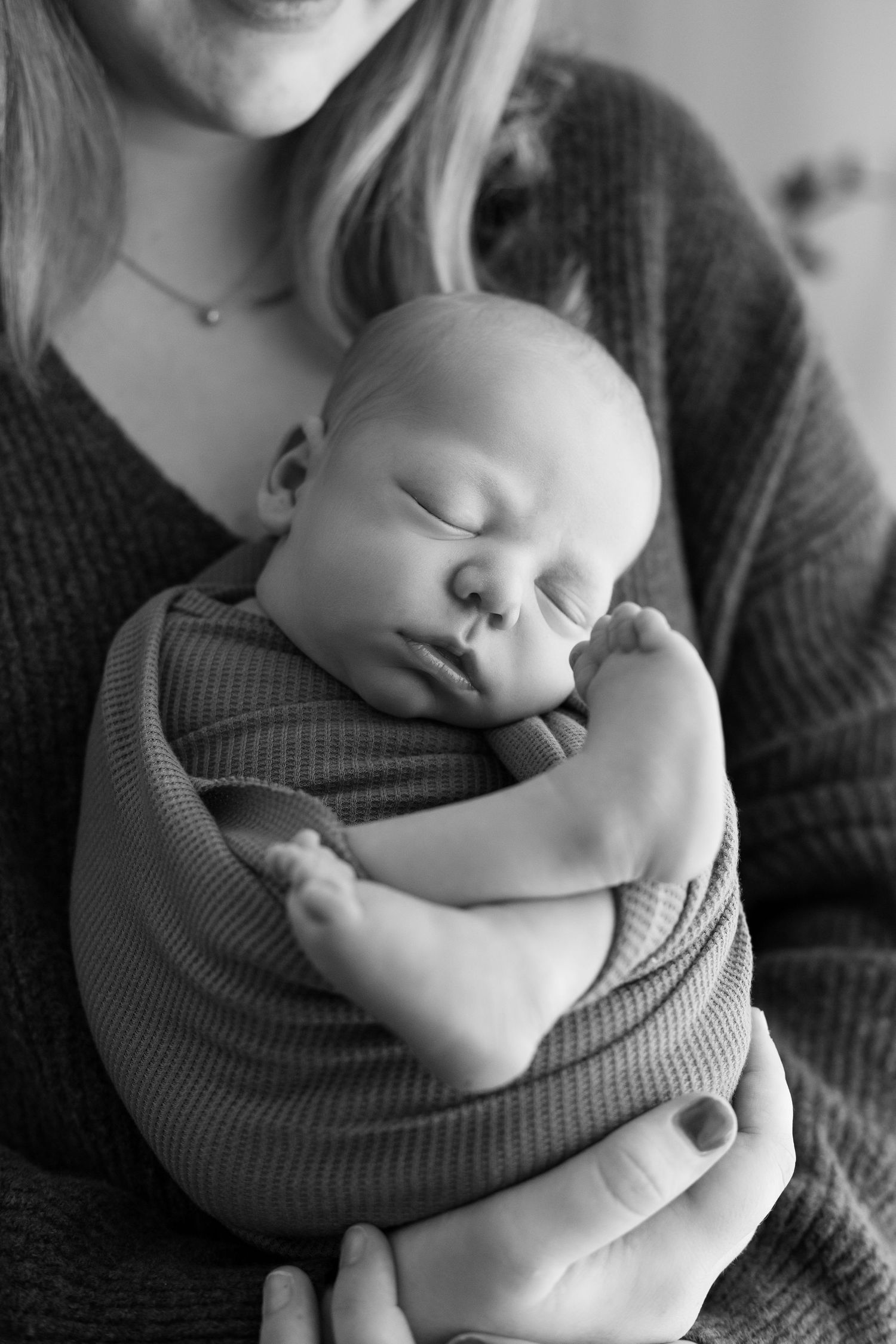 Newborn boy held by mom Southeast Minnesota