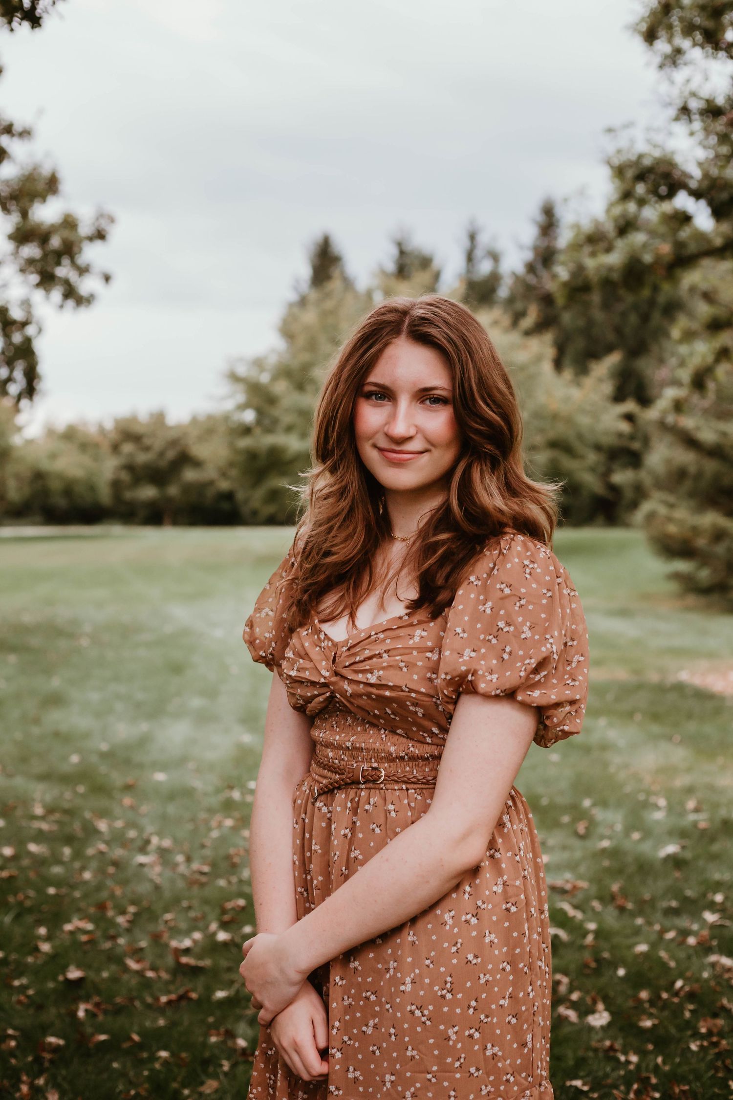 Portrait of girl in grassy field Southeast Minnesota