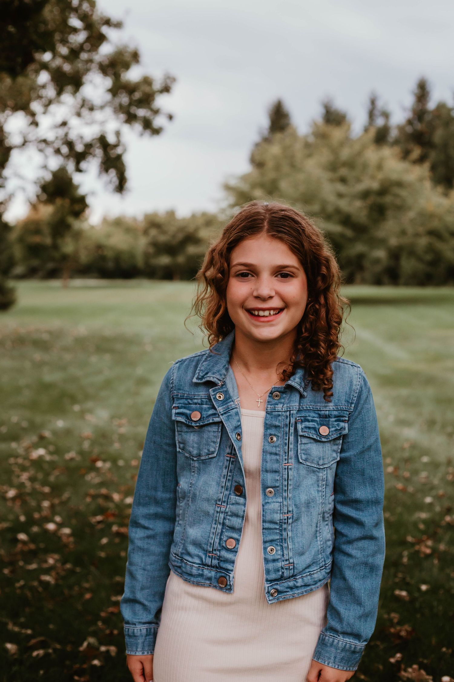 Portrait of girl in grassy field Southeast Minnesota