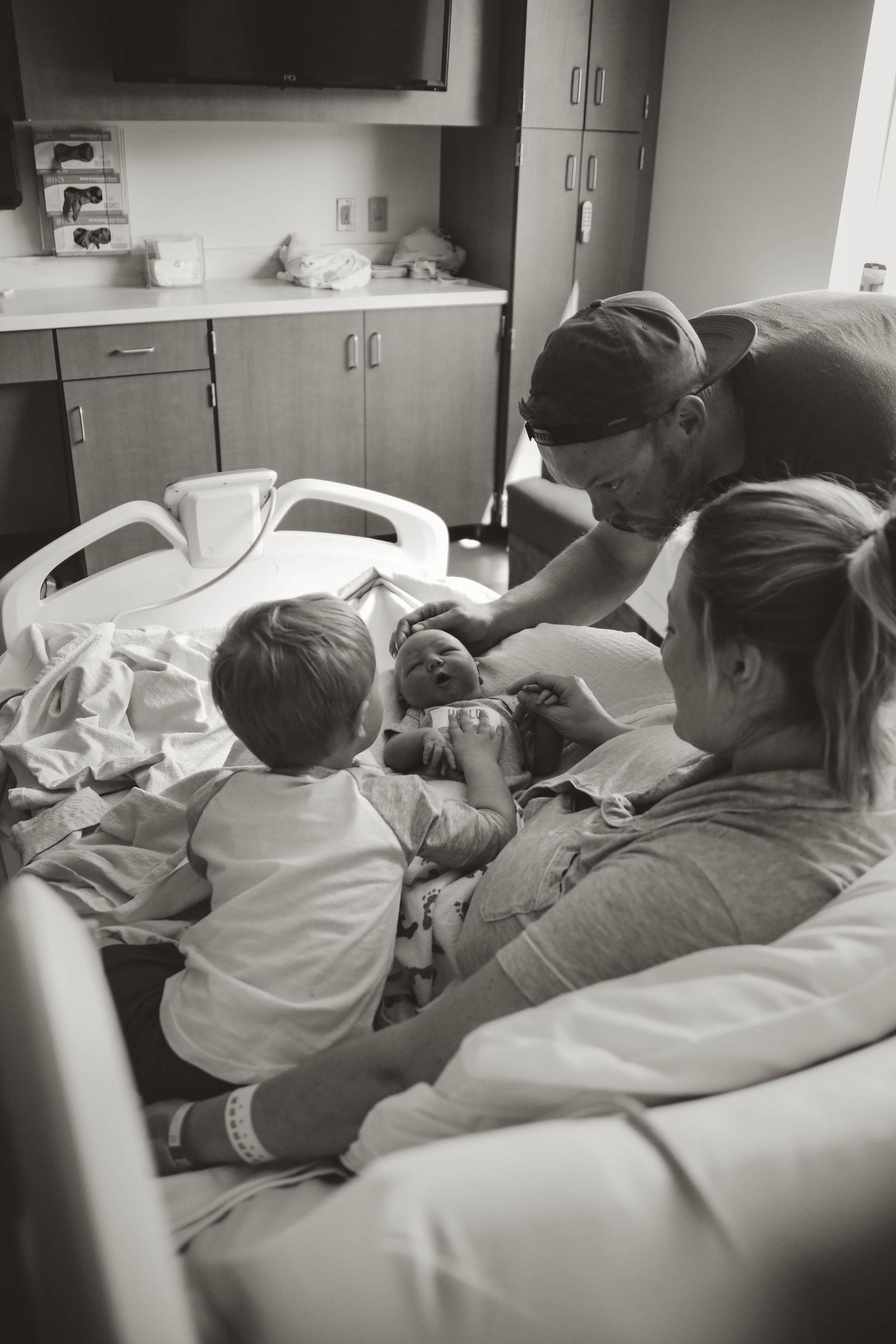 New family of four at hospital after birth Southeast Minnesota