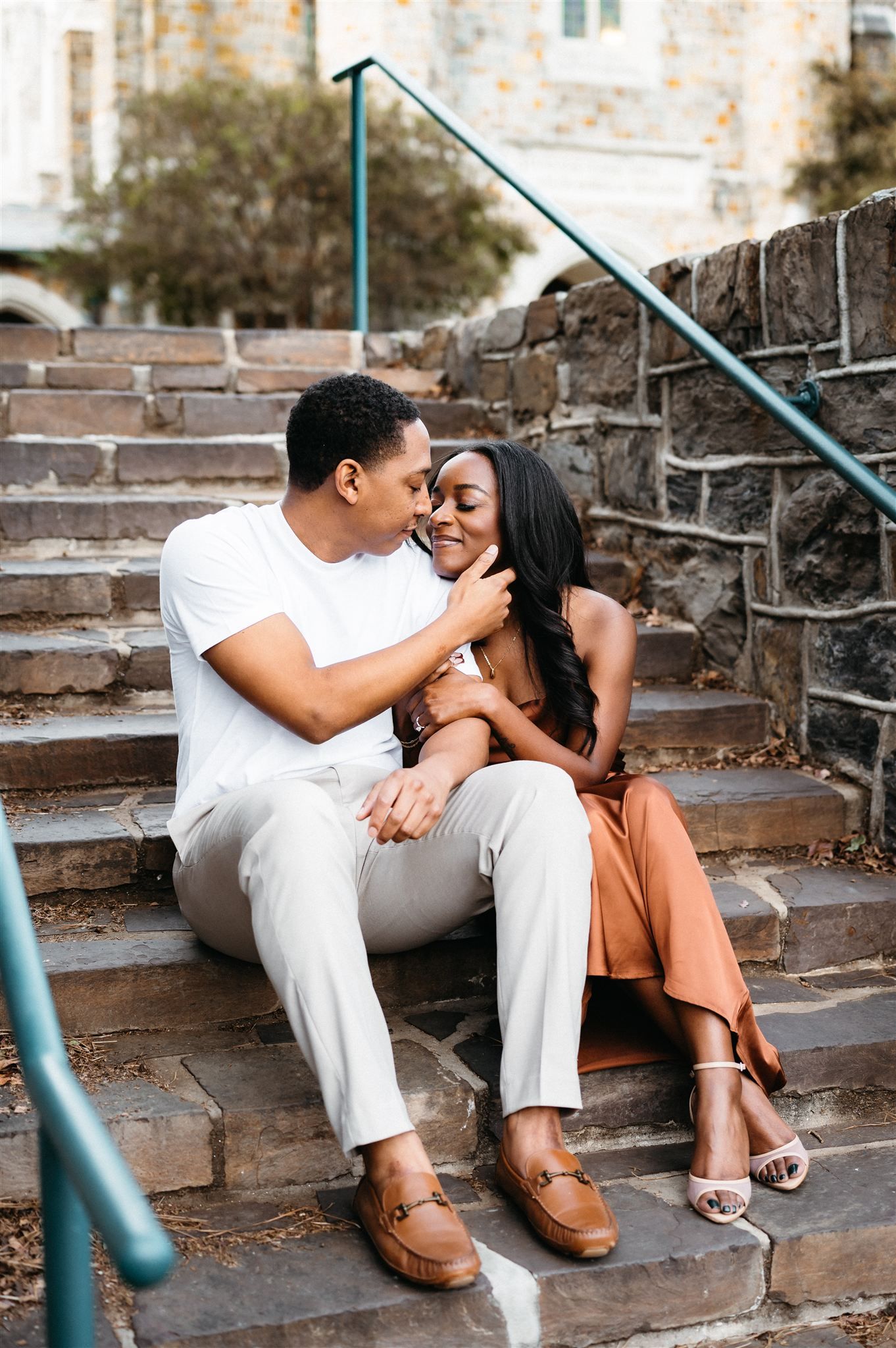 Couple sharing romantic cuddle during engagement session in Atlanta Georgia