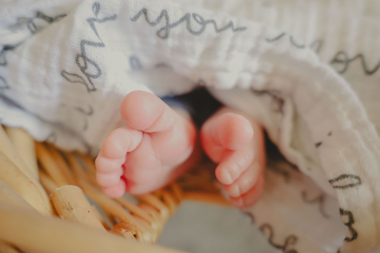 Newborn session featuring baby toes.