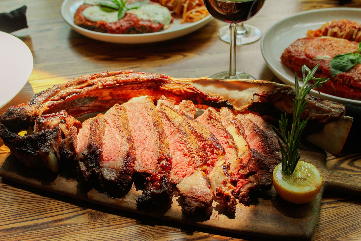 Food photography featuring steak and wine