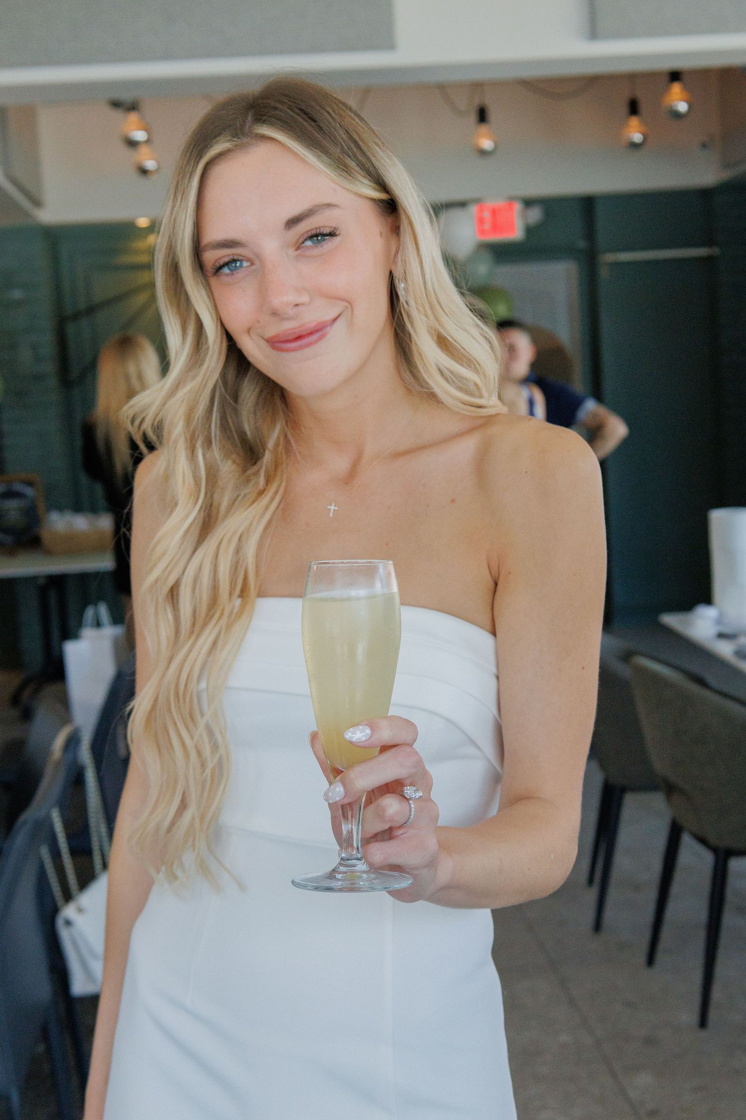 bride smiling at bridal shower