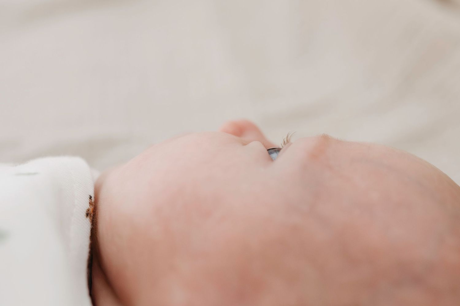 A close-up image of newborn baby's lashes during an in home lifestyle photoshoot