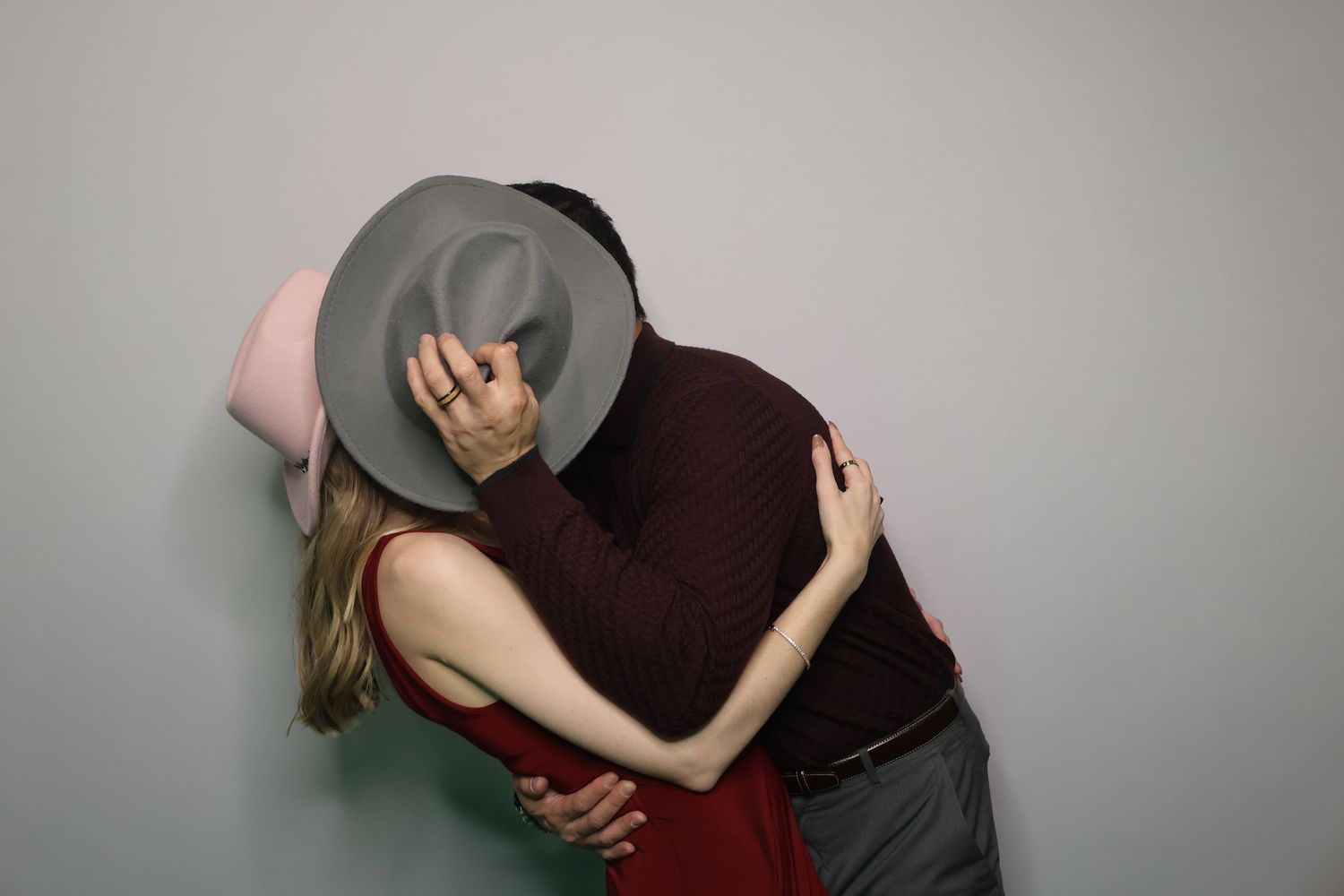Couple posing for romantic photos for a photo booth at an event
