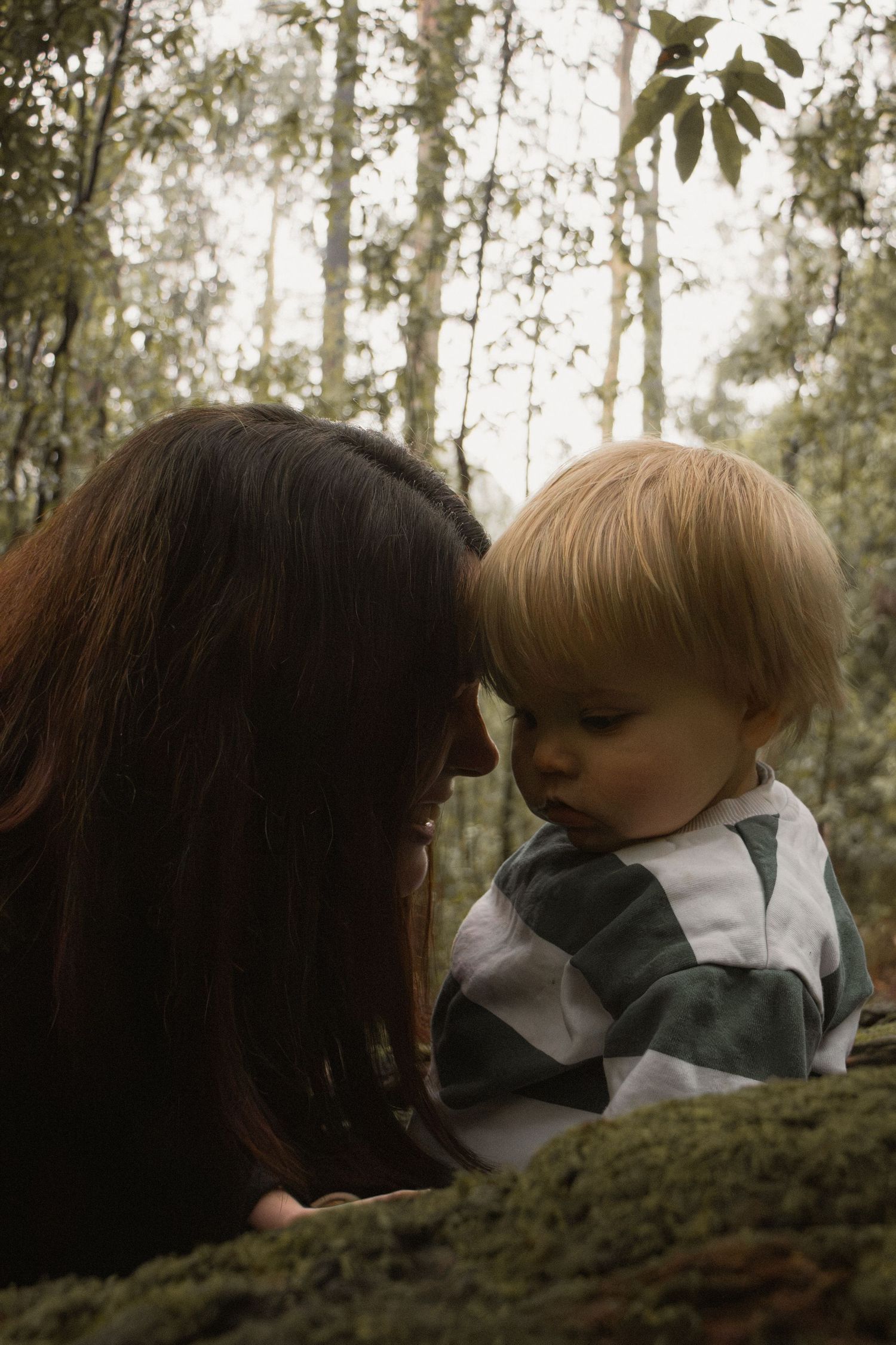 A child and mum connecting at Uralla reserve in the outdoors in central Gippsland. Taken for a motherhood session.
