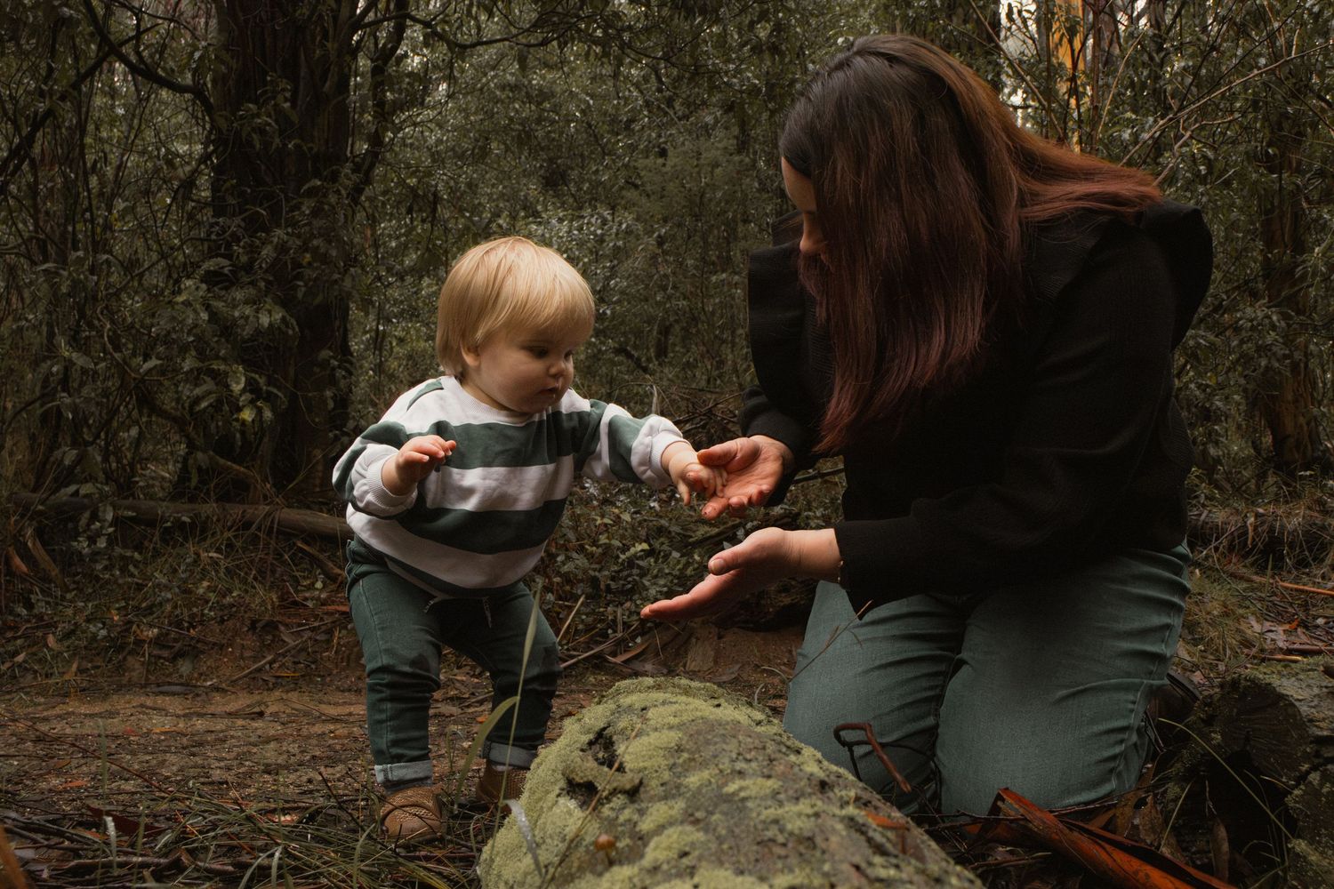 Mother exploring outdoors with toddler, in the morning at lifestyle motherhood photo session in the outdoors in Trafalgar, West Gippsland.