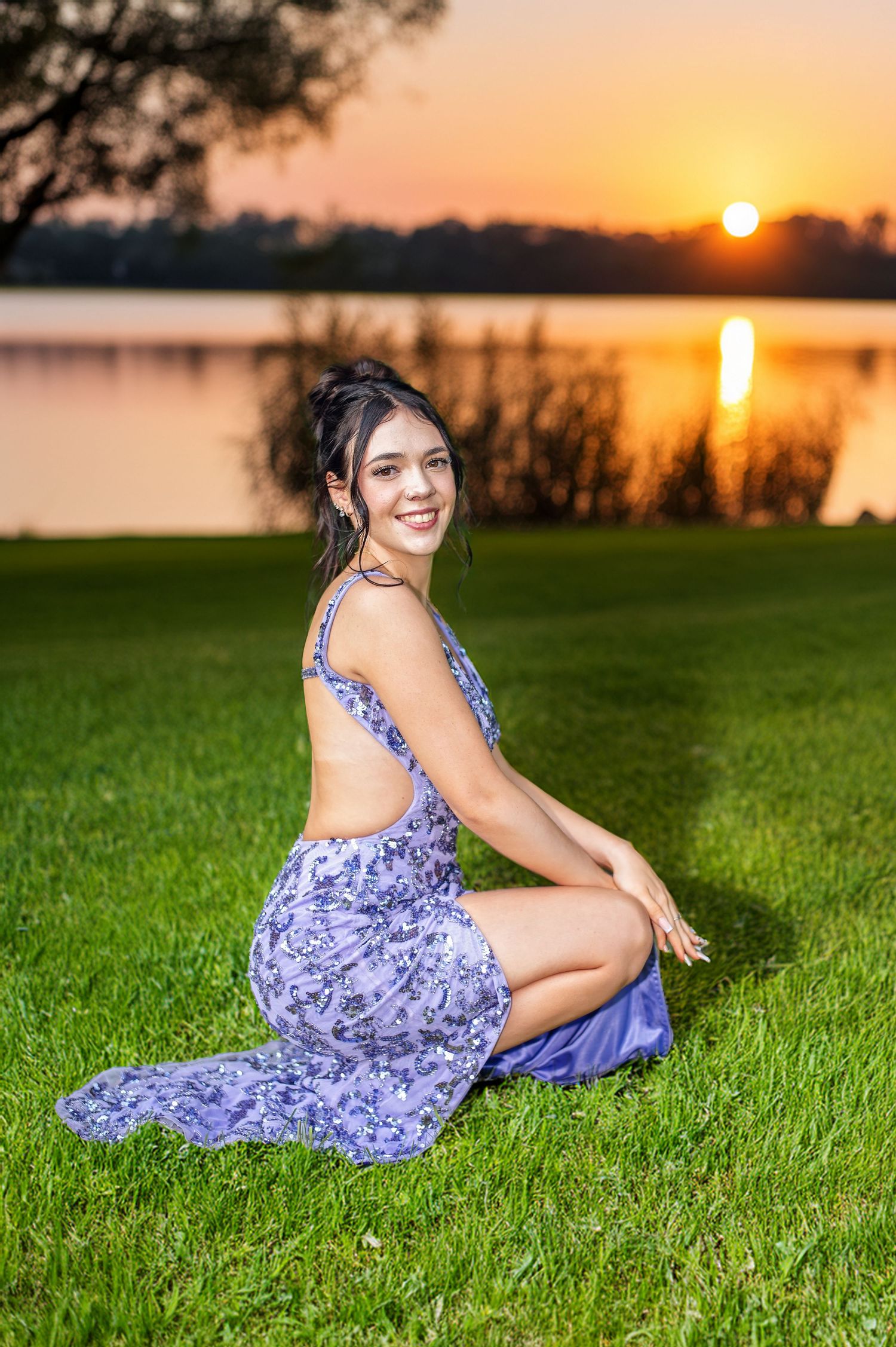 Purple floral dress portrait session at sunset by the water.