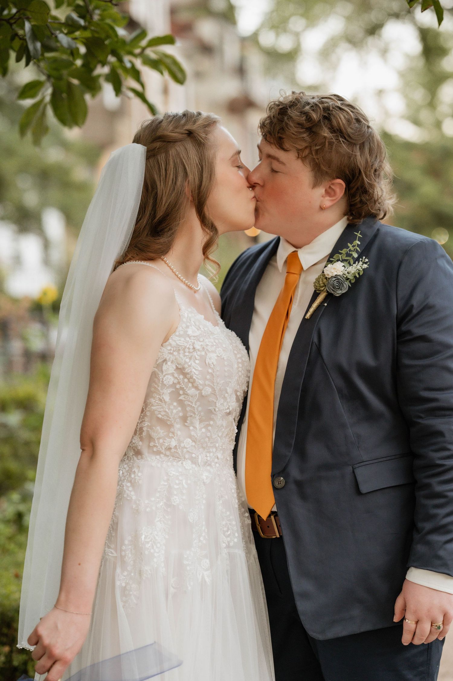 Two married people kissing