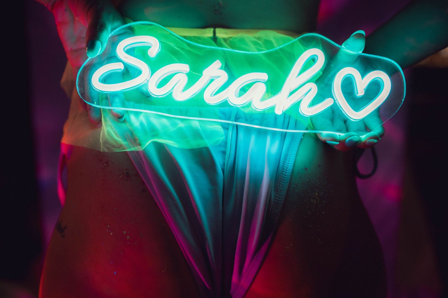 A neon sign that says 
