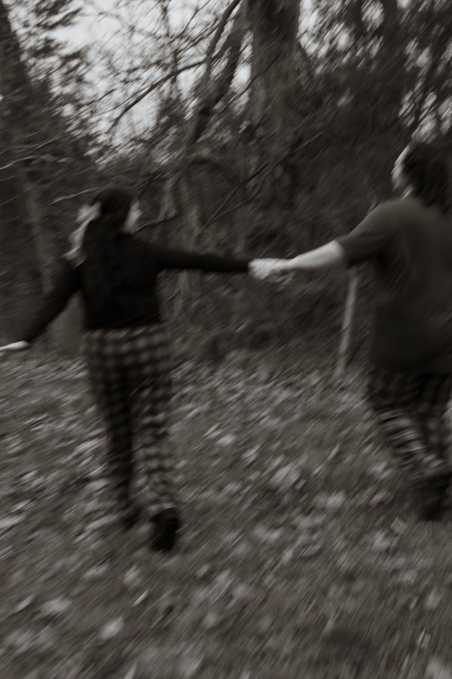 Two people holding hands