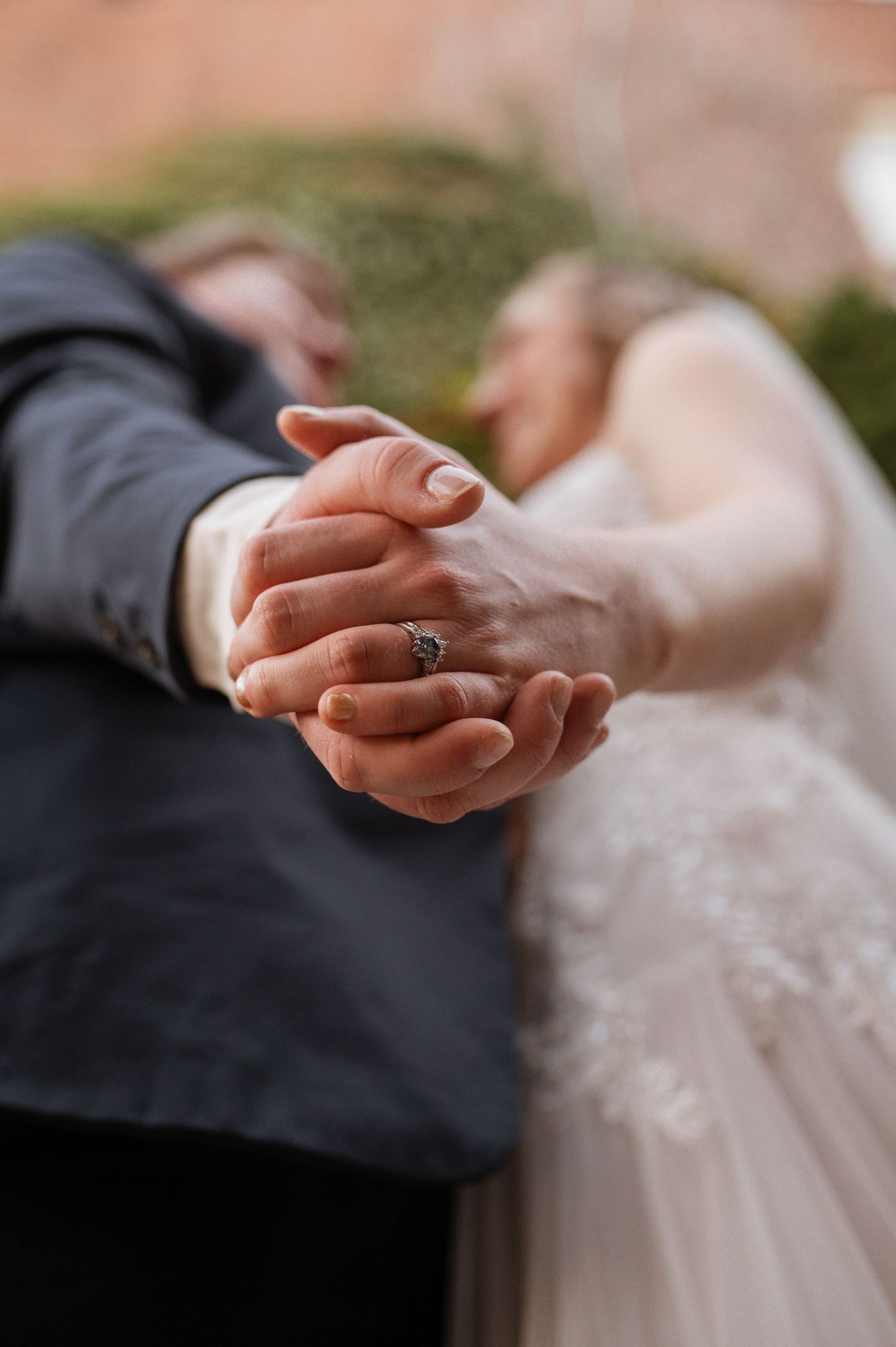 The hands of two married people.