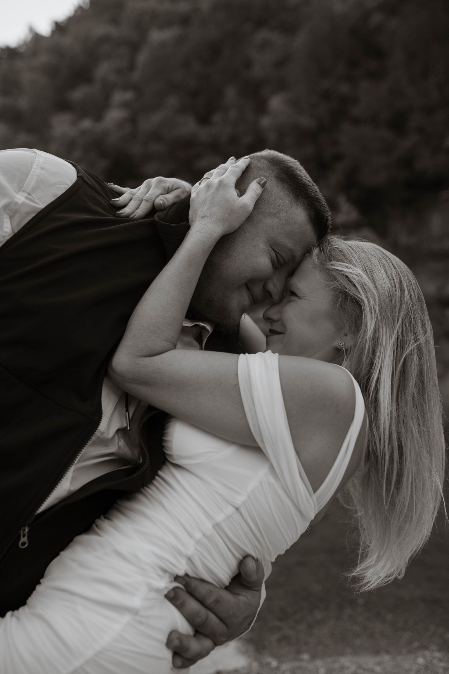 A groom dipping his bride