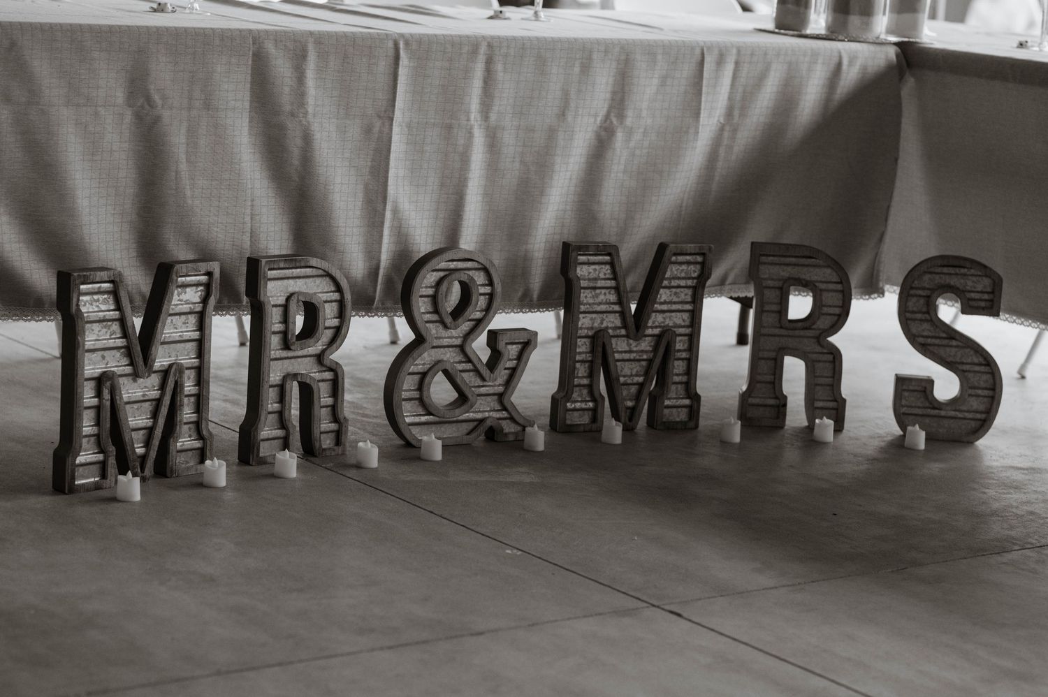 Mr. and Mrs. sign.