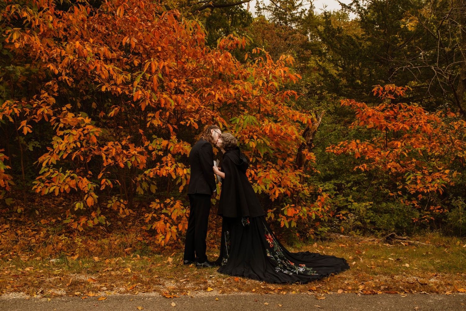 A bride and groom kissing