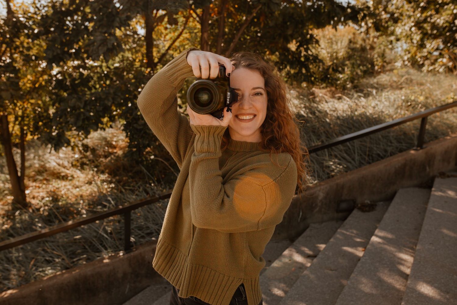 A woman taking a photograph