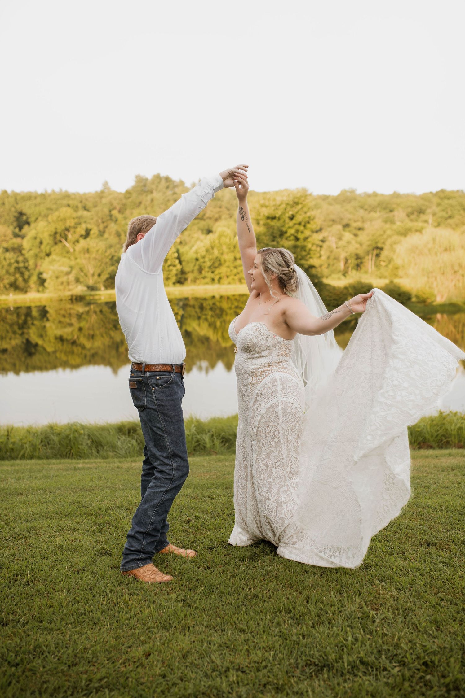 A groom spinning a bride around.