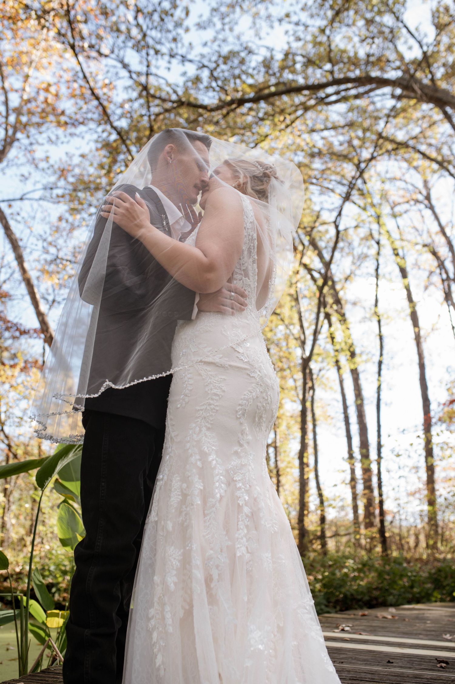 A bride and groom embracing