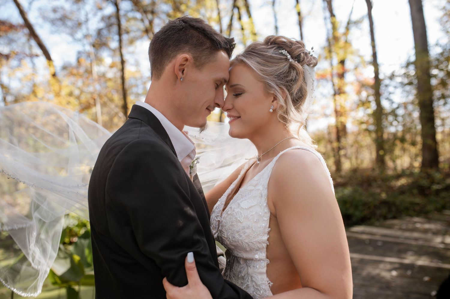 A bride and groom embracing.