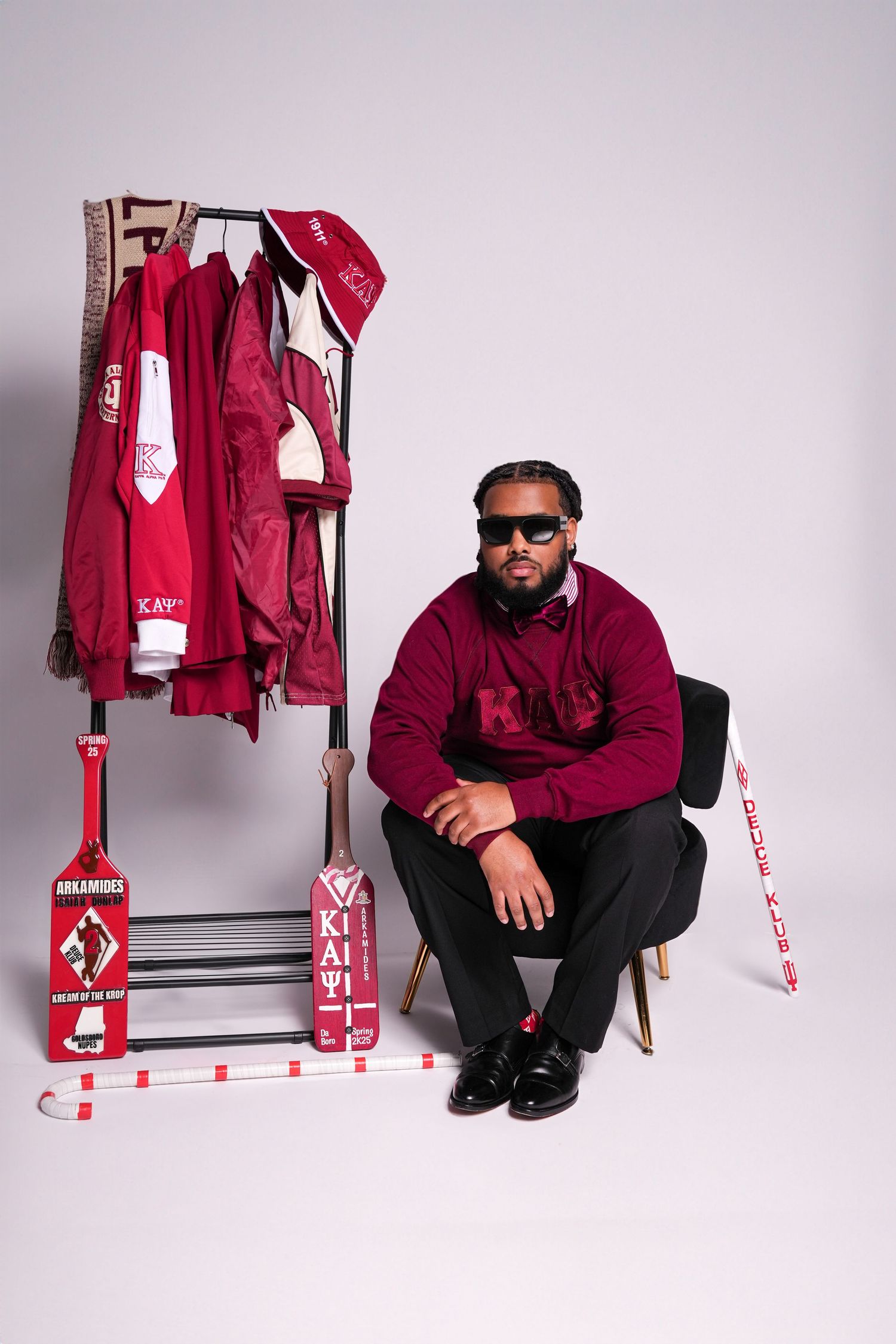 Stylized photo series with burgundy clothing and accessories against white background.