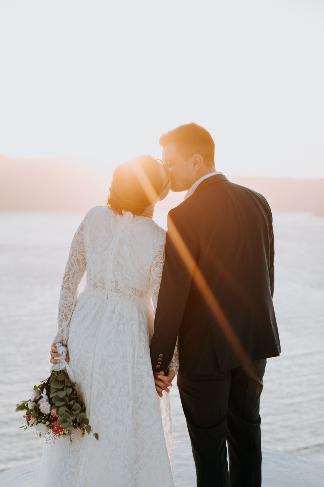 Elopement photographer Oia Fira Pyrgos Skaros Santorini Greece