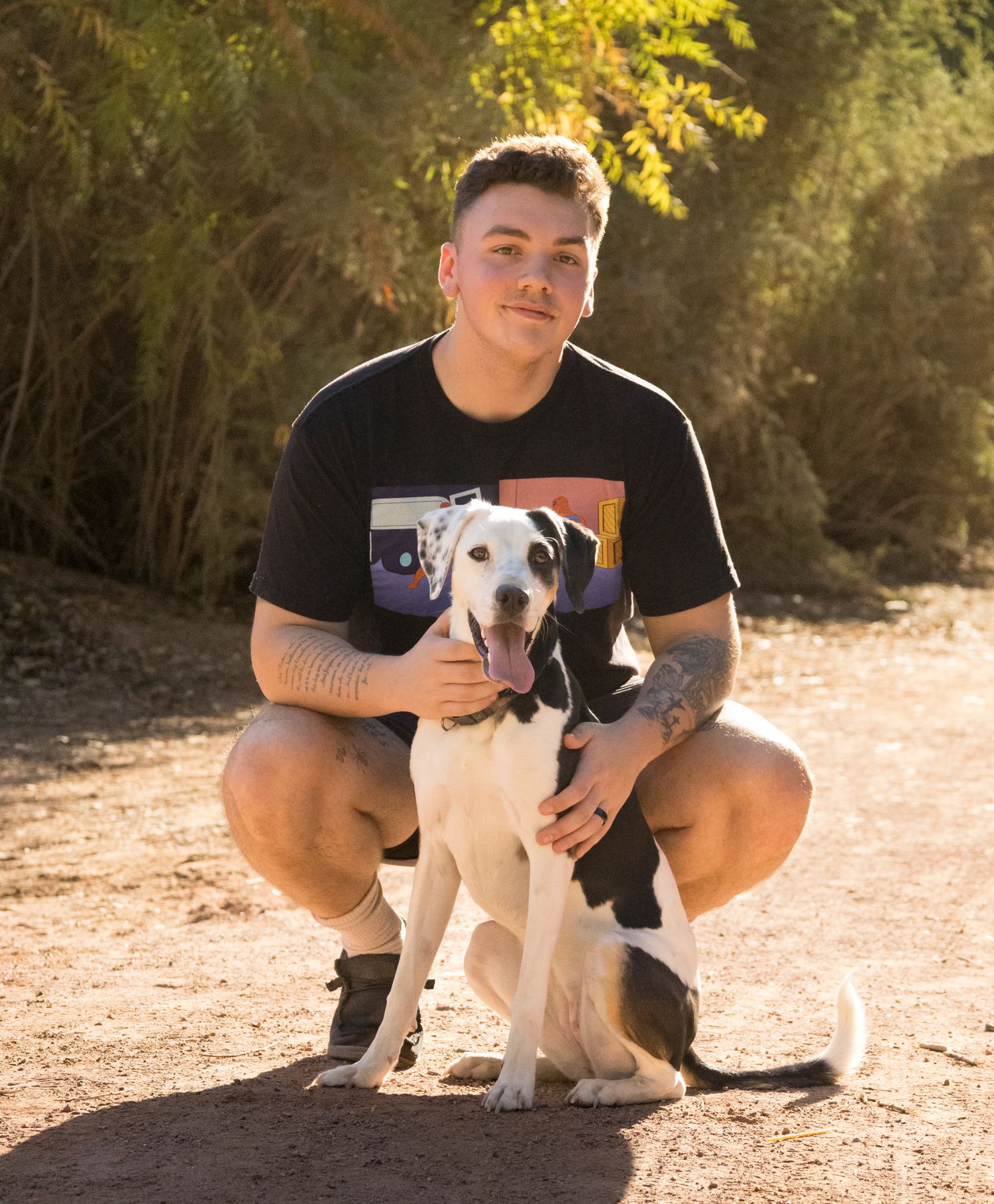 Super handsome guy with a very cute dog, professional photography