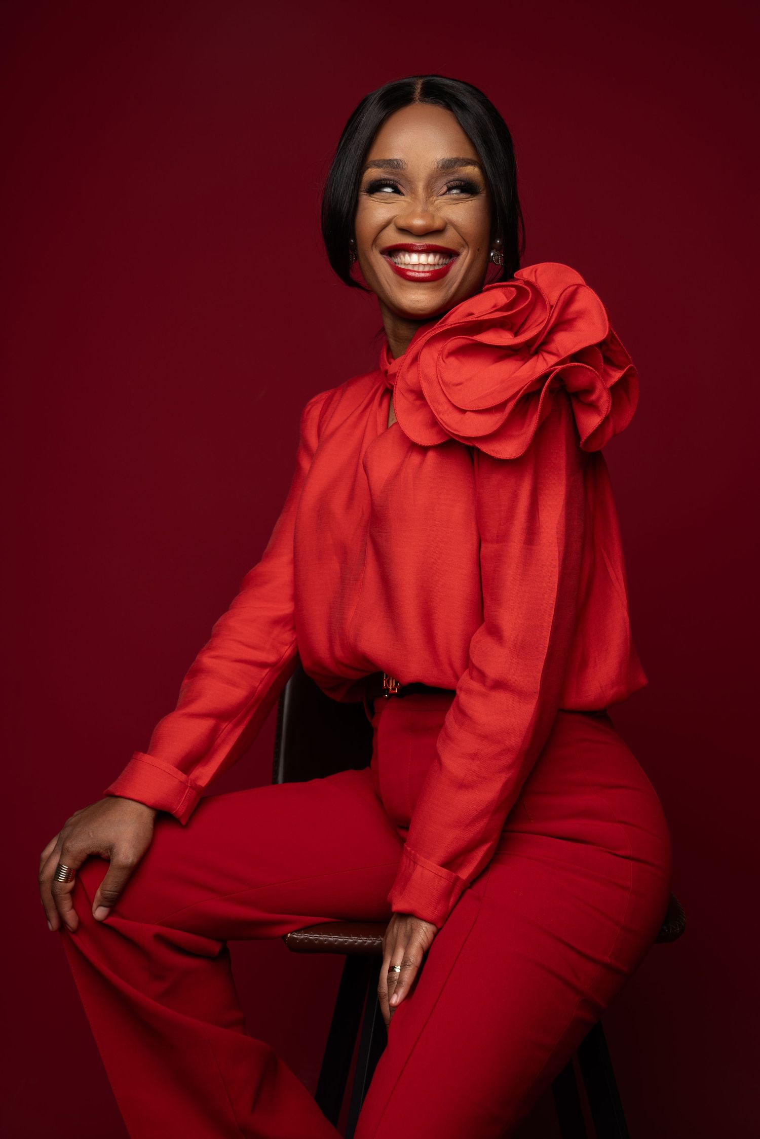 Artistic portrait series showcasing a bold red ensemble with dramatic lighting.