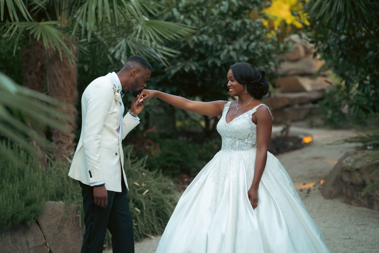 A series of romantic wedding portraits captured in a lush garden setting at golden hour.