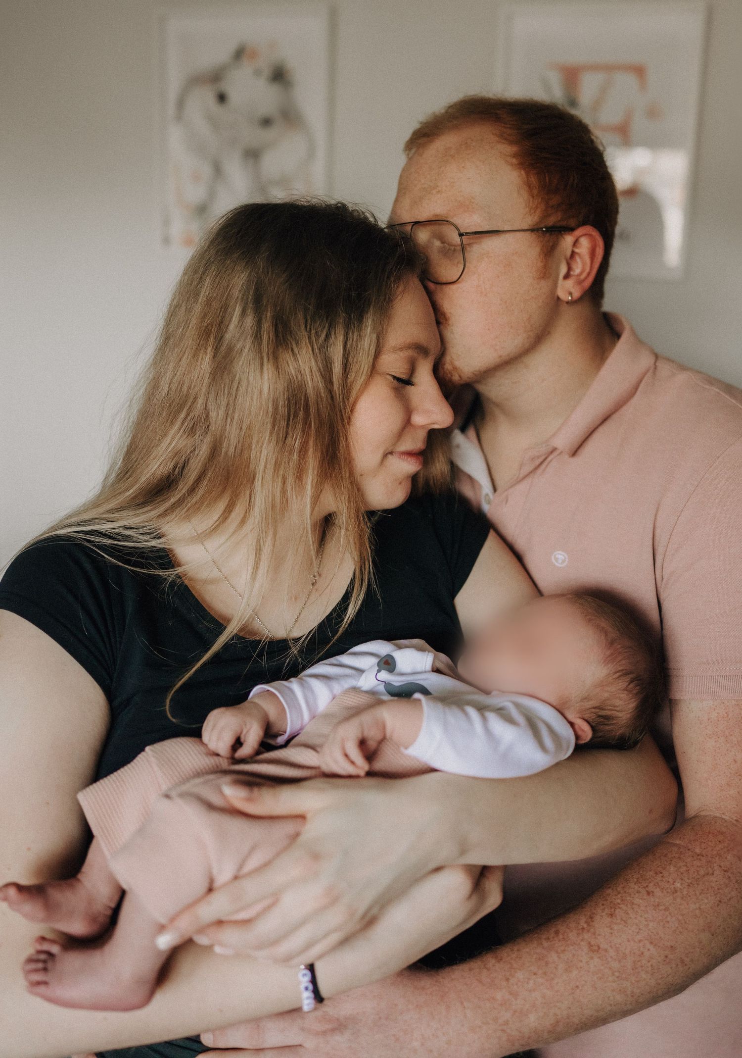 A tender family moment captured in a series of intimate photographs showing parents bonding with their newborn baby.