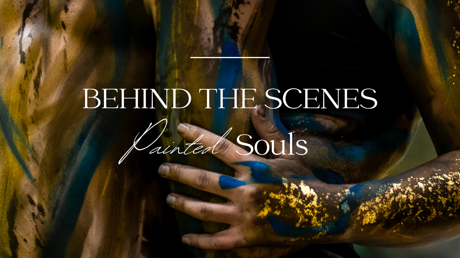Behind the scenes of Painted Souls art project featuring figures covered in blue and gold paint.