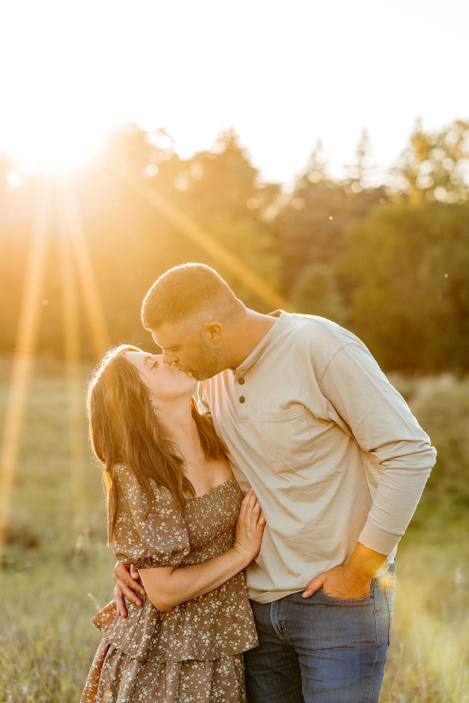 Delafield WI family photos in tall grass field during golden hour