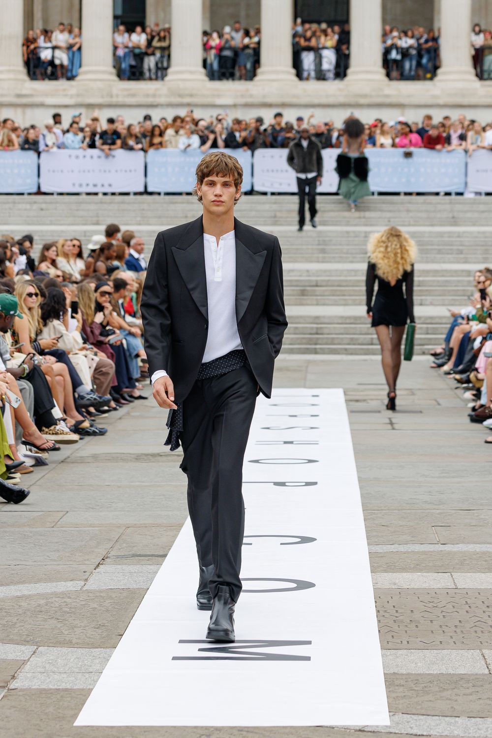 Professional fashion runway photography from the Topshop & Topman 2025 relaunch event in Trafalgar Square, captured by Farheen Shaikh