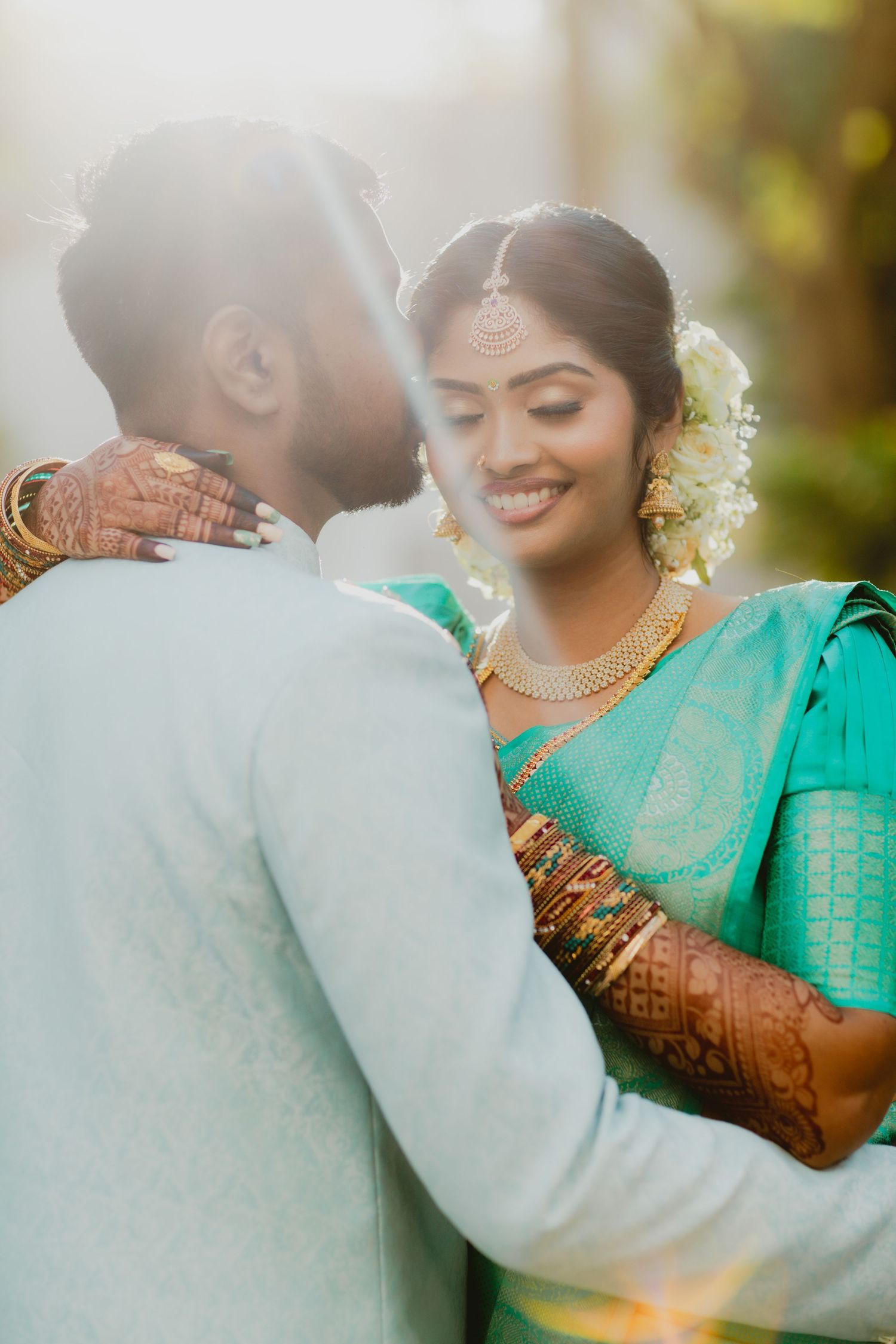 Couple smiling during temple wedding moment, natural candid photography